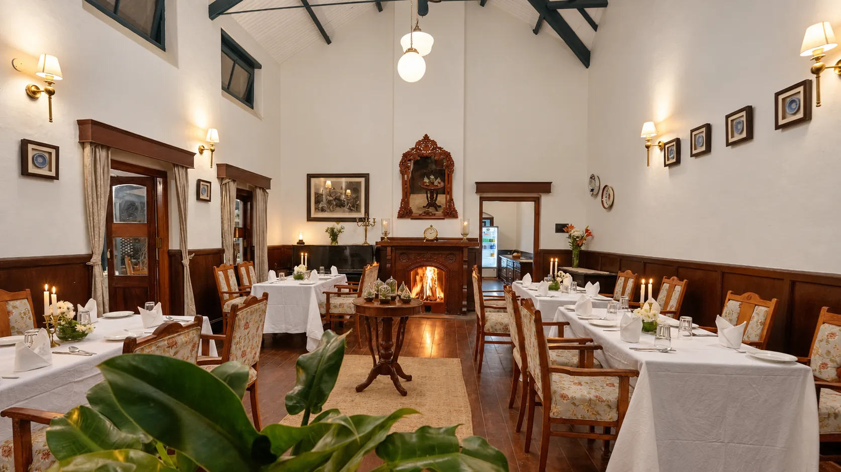 The dining room, tables laid under a beamed ceiling