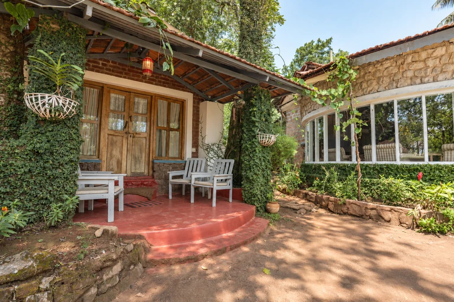 A corner of the veranda, chairs beside the glazed room