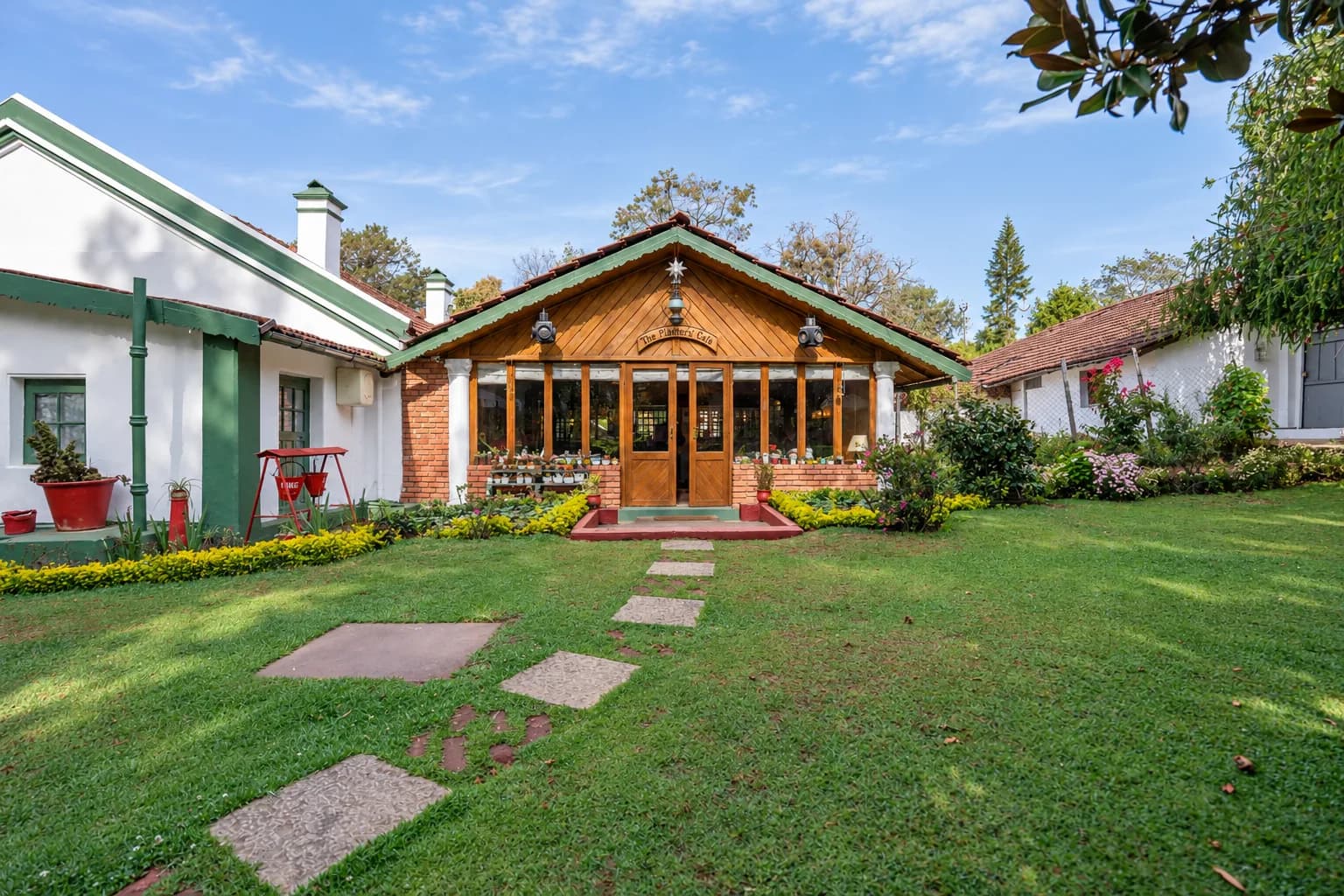 The front of the house, its stone path crossing the lawn